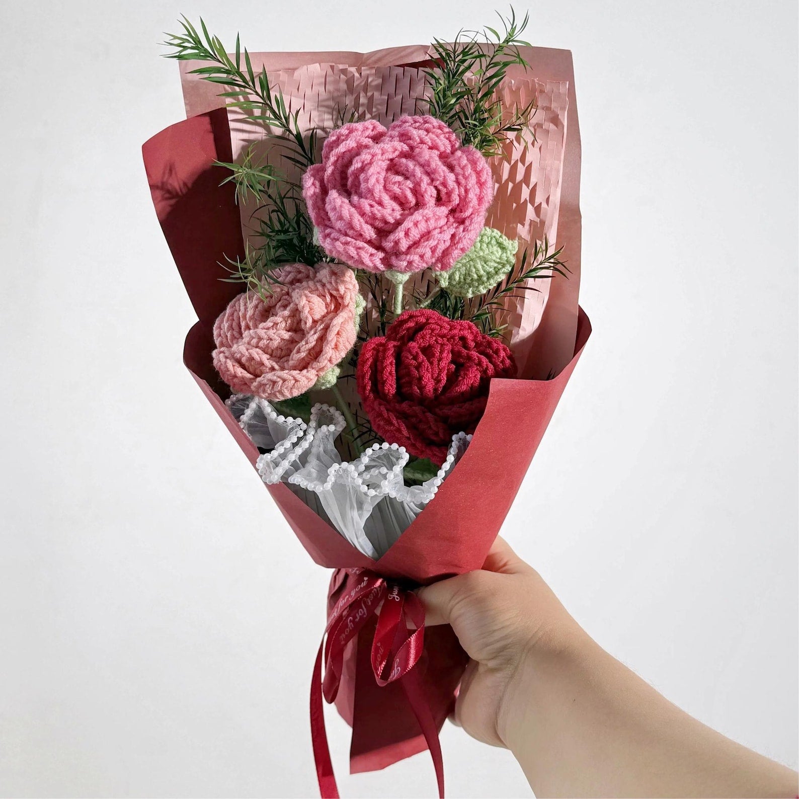 Yarn bouquet in shades of pink